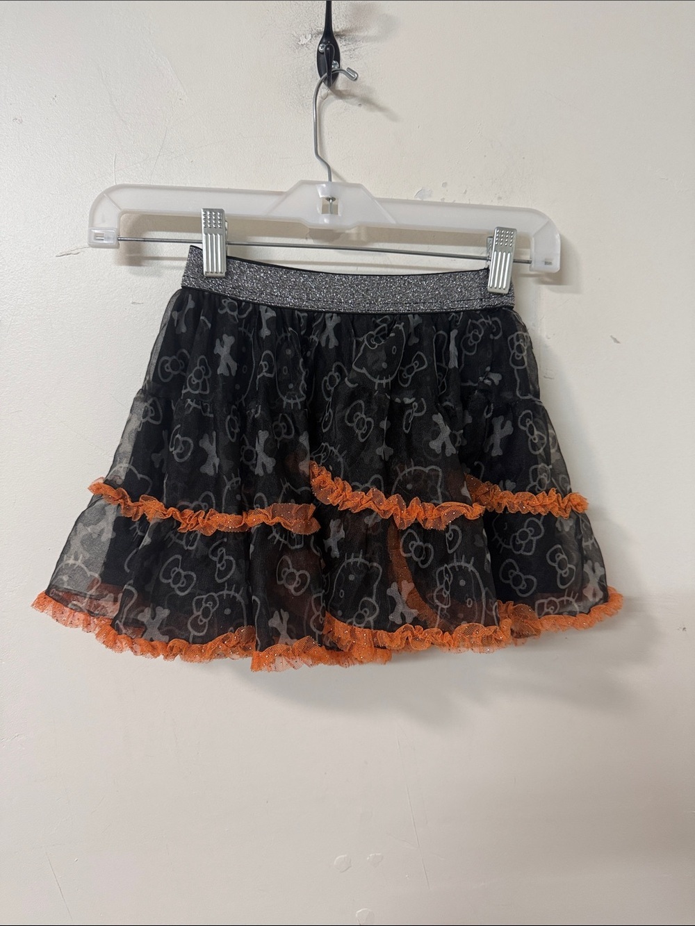 Hello Kitty Black Skirt with Orange Ruffle Trim dated 2016
